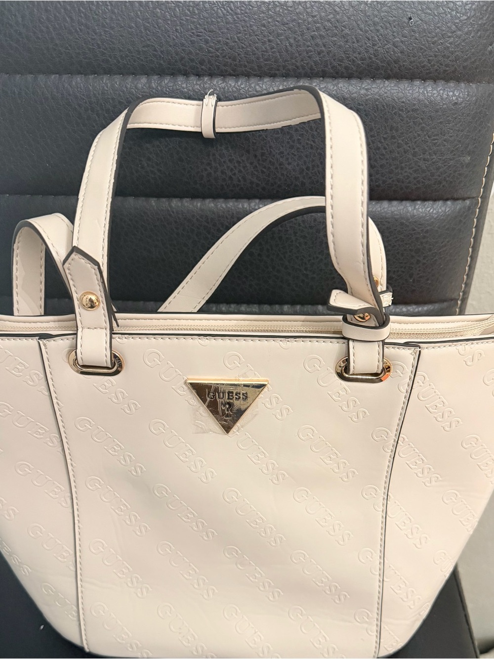 GUESS Cream Embossed Logo Tote with Gold Accents